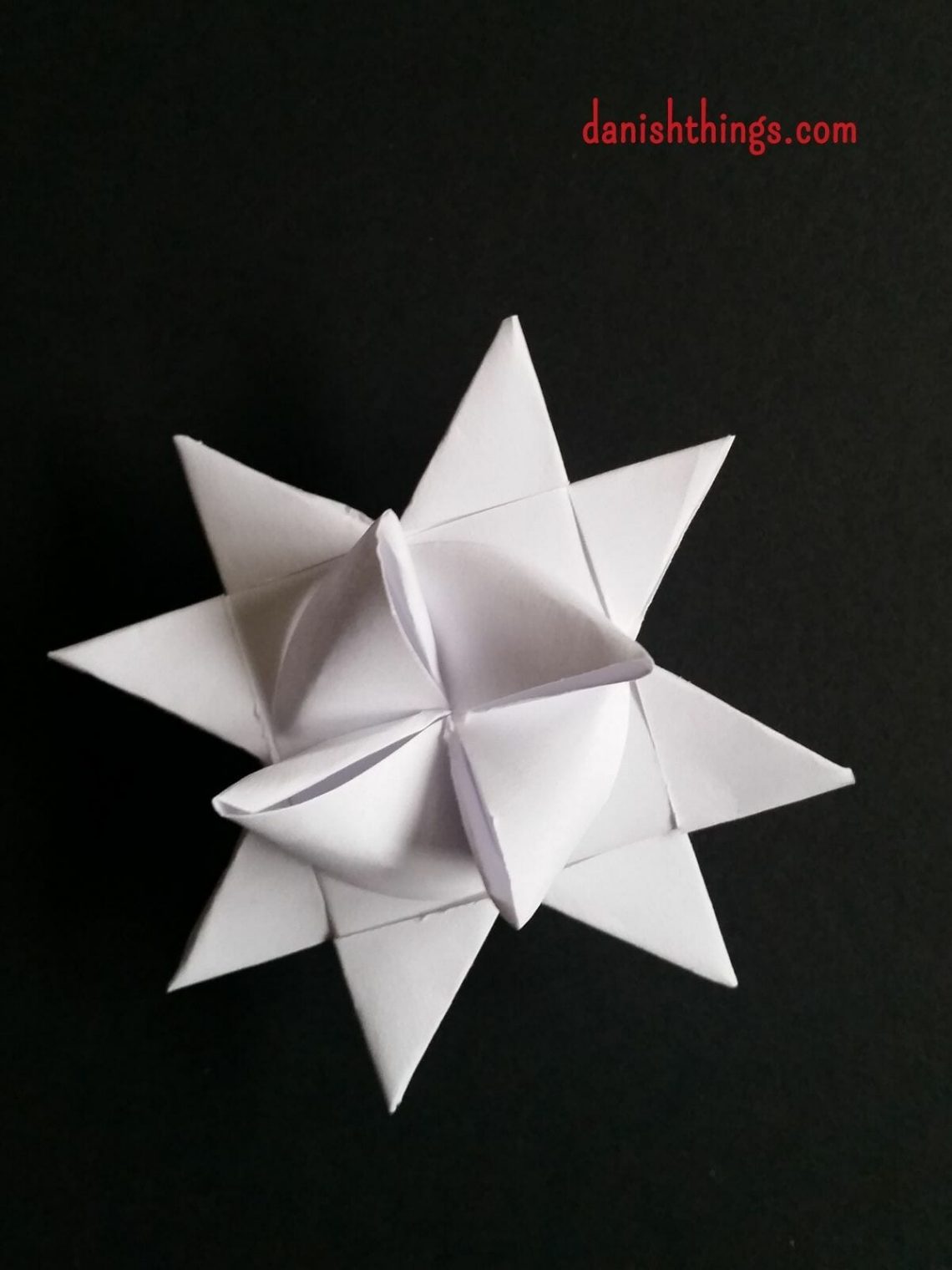 How to make a Froebel star - a classic Danish Christmas decoration. A Christmas star - step-by-step guide. Whether you weave or fold paper stars, if you are a beginner or experienced, you will get help with text, photos, and videos for every step. Find recipes, step-by-step guides, free print, and inspiration for this time of year at danishthings.com © Christel Parby - Danish Things #DanishThings #froebelstar #frobelstern #paperstar #paper #star #howto #howtoguide #danish #christmas #decoration #homemade #decoration #danishchristmas #danishstar #adventstar #advent #nordic #german #christmasstar